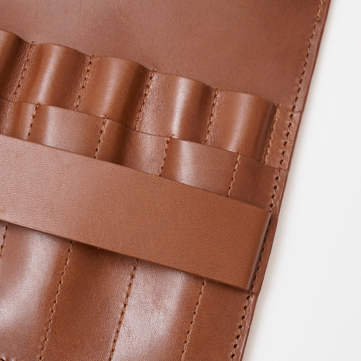 Läderetui Virkning Cognac